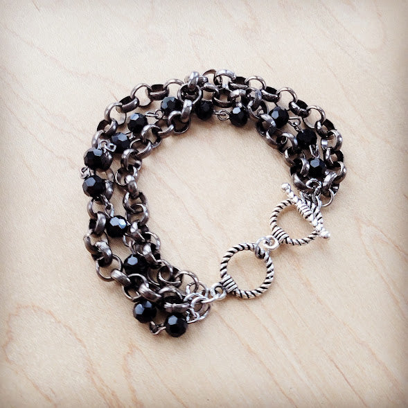 **Black Faceted Triple Strand Beaded Bracelet